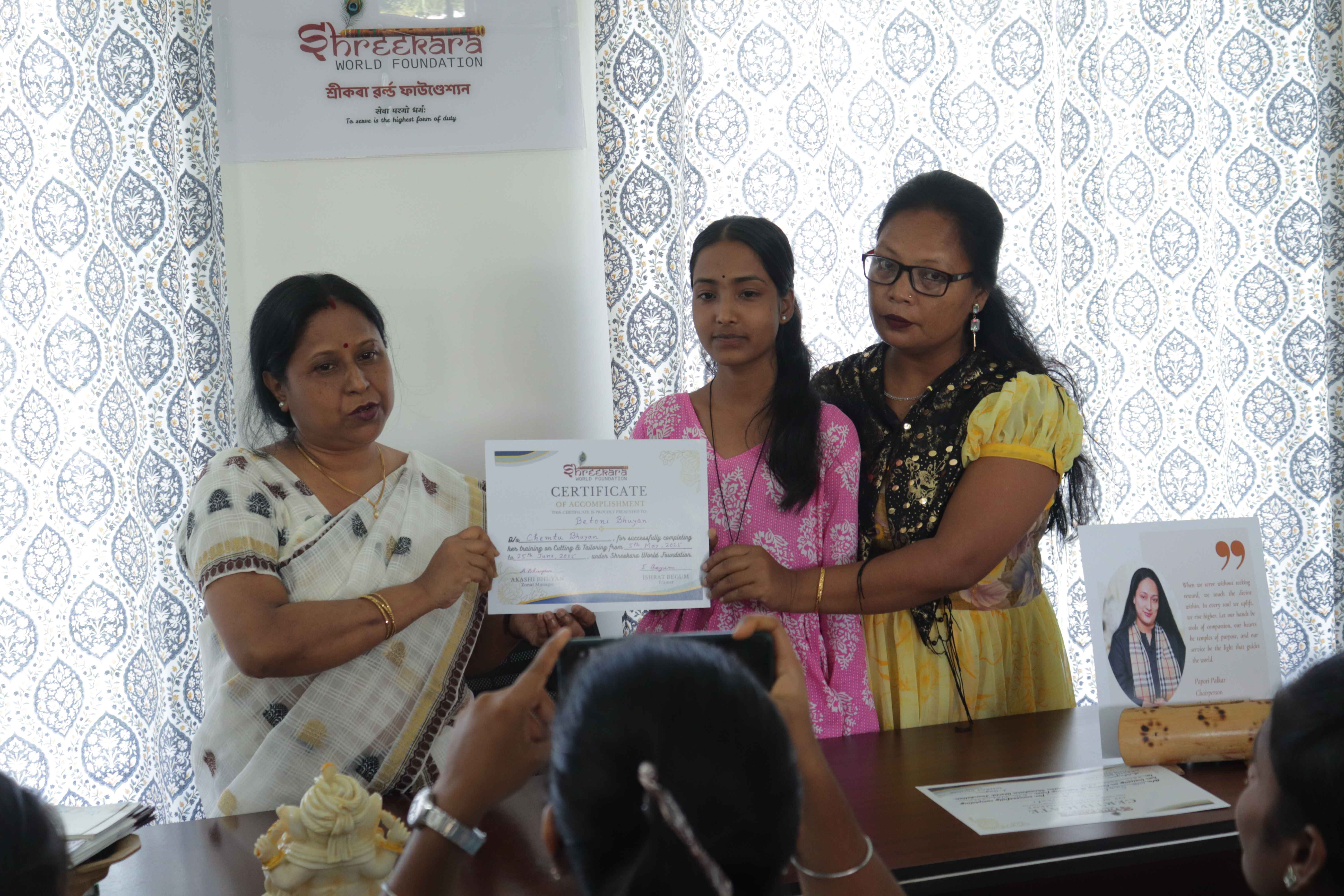 Certificate distribution ceremony for achar training participants.