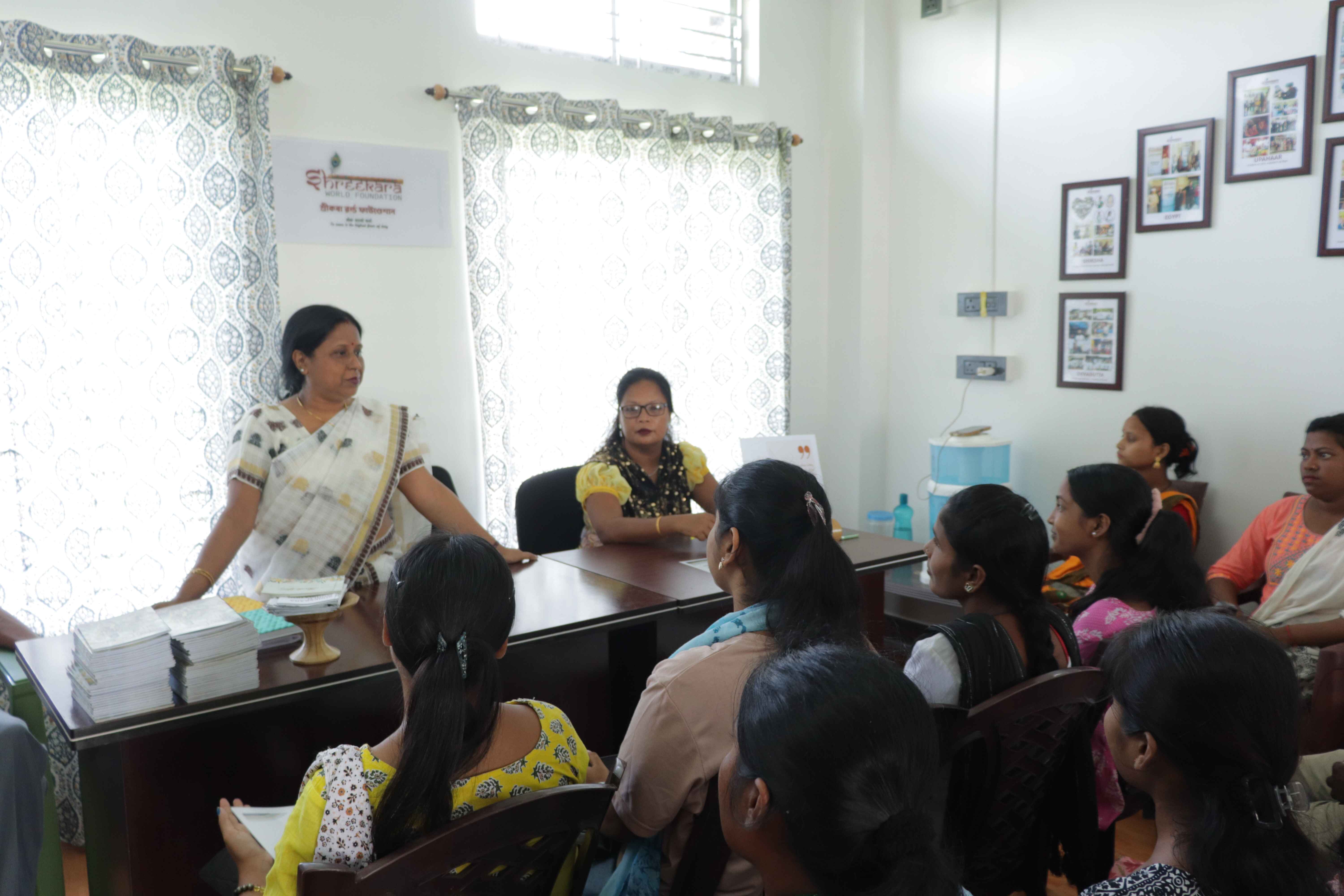 Certificate distribution ceremony for achar training participants.
